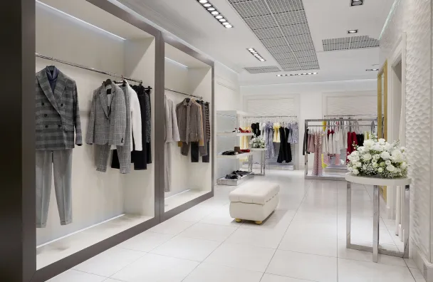 Commercial remodeling in Los Angeles with boutique showroom upgrade, bright lighting, display walls, tile flooring, and modern retail interior design
