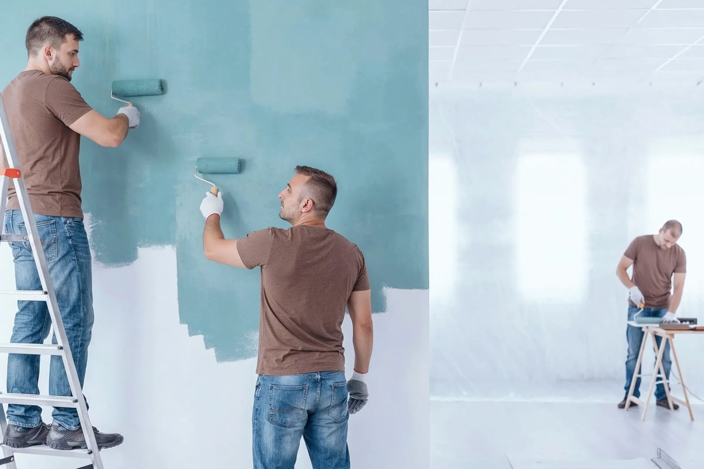 Home remodeling in Los Angeles with interior painting, wall updates, and contractors preparing a residential living space for renovation